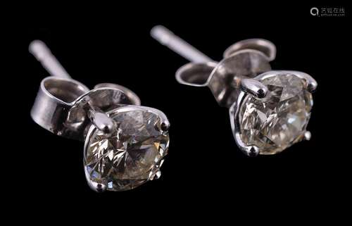 A pair of diamond ear studs