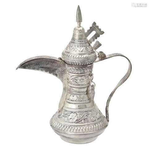 An Omani silver coloured tea pot