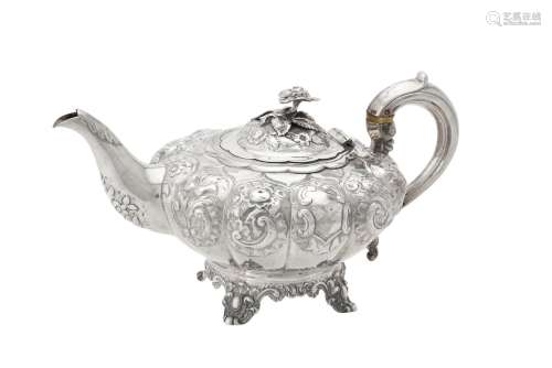Y A Victorian silver lobed circular tea pot by William Hunte...