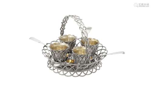 A Victorian silver circular egg cup basket by Edward, Edward...