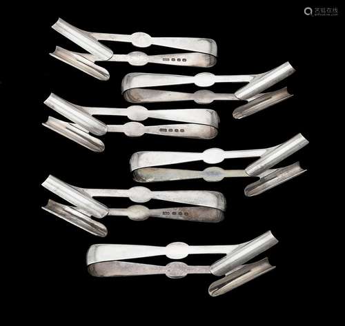 A set of six silver asparagus tongs by Elkington & Co.