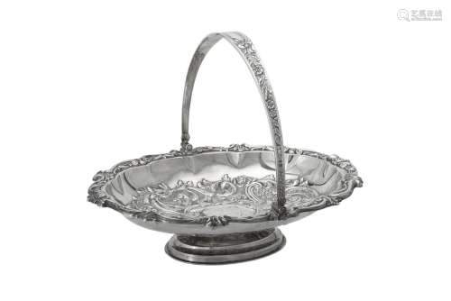 A late Victorian silver shaped oval swing handled basket by ...