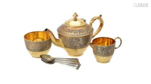 Y A cased Victorian silver gilt three piece tea set by Elkin...