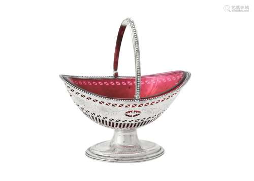 A George III silver oval swing handled basket by Solomon Hou...