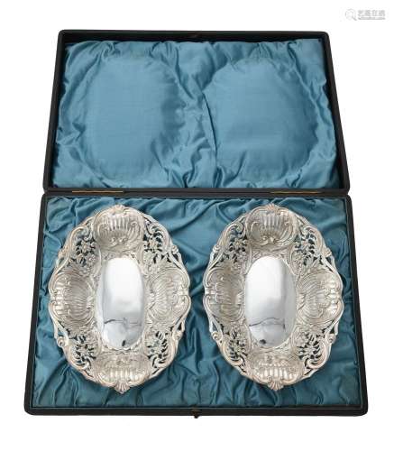 A cased pair of Victorian silver shaped oval dishes by Horto...