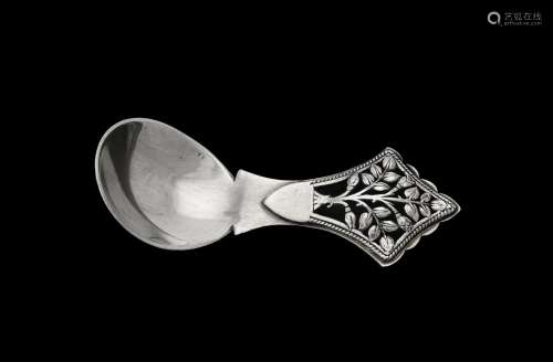 An Arts & Crafts silver tree of life pattern caddy spoon by ...