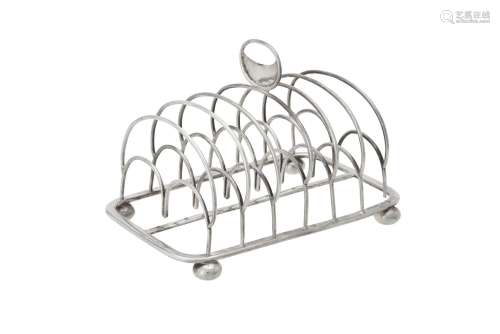 A George III silver six division toast rack by John & Henry ...