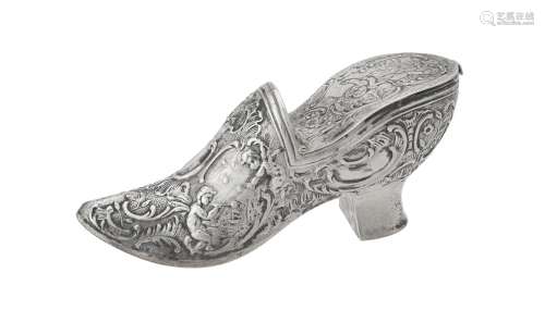 A continental silver coloured box modelled as a shoe