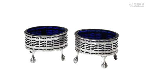 A pair of George III silver oval salts