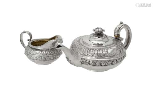 Y A George IV silver circular tea pot and cream jug by Rebec...