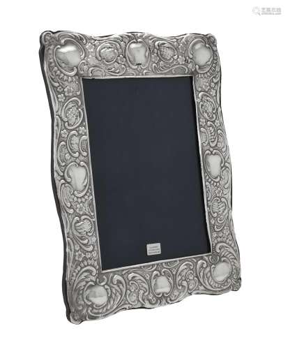 A silver mounted shaped rectangular photo frame by Ray Hall