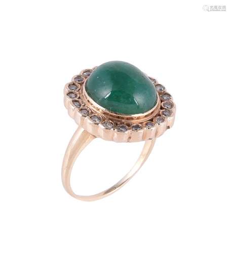 An emerald and diamond cluster dress ring