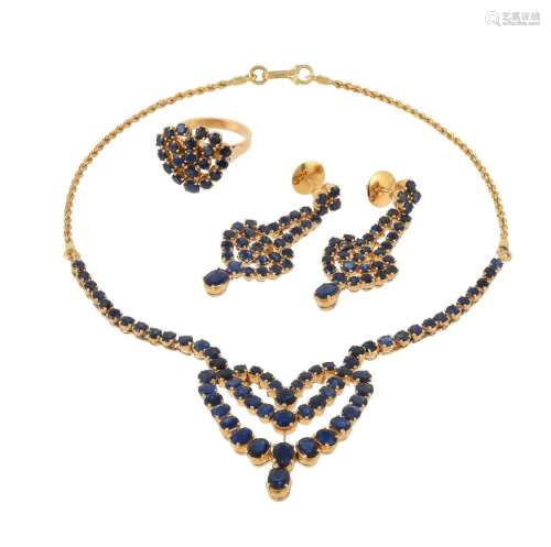 A sapphire necklace, ring and earrings suite