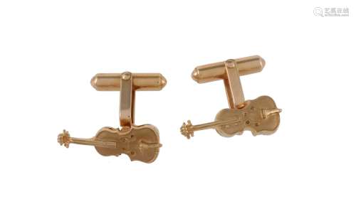 A pair of gold coloured violin cufflinks