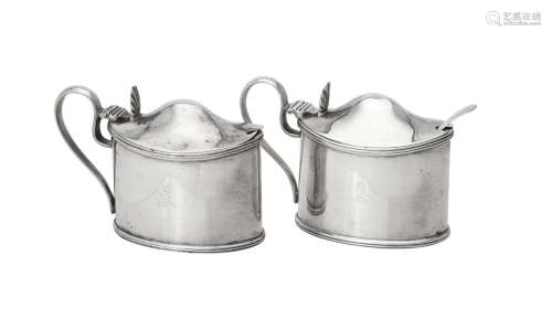 A pair of Victorian silver oval mustards by Daniel & John We...