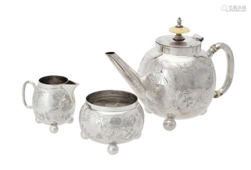 Y A Victorian silver globular three piece tea set by Charles...
