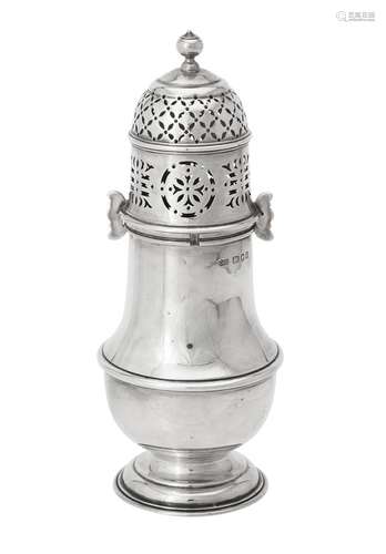 A silver baluster sugar castor by Carrington & Co.