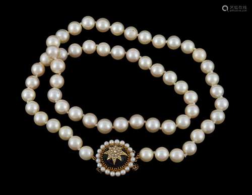 A cultured pearl necklace with amethyst clasp