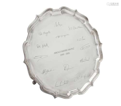 A silver shaped circular salver by C. J. Vander Ltd.