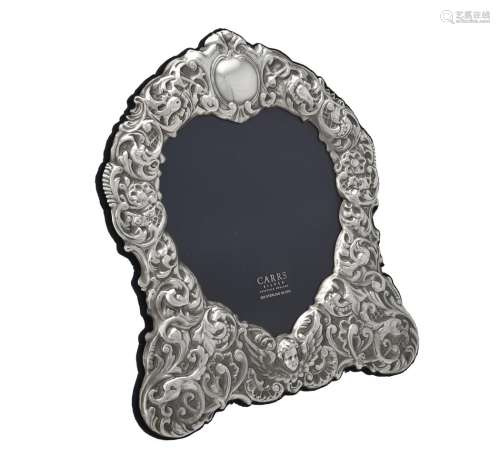 A silver mounted shaped photo frame by Carr's of Sheffield L...