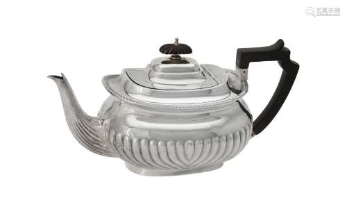 Y An Edwardian silver oblong baluster tea pot by Atkin Broth...