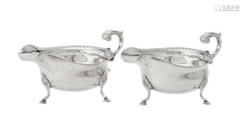 A pair of silver oval sauce boats by C. J. Vander Ltd.