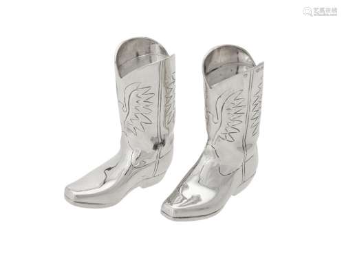 A pair of silver novelty cowboy boot salt and pepper shakers