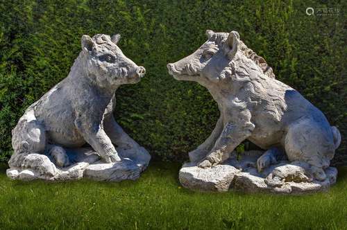 A pair of sculpted limestone models of wild boars