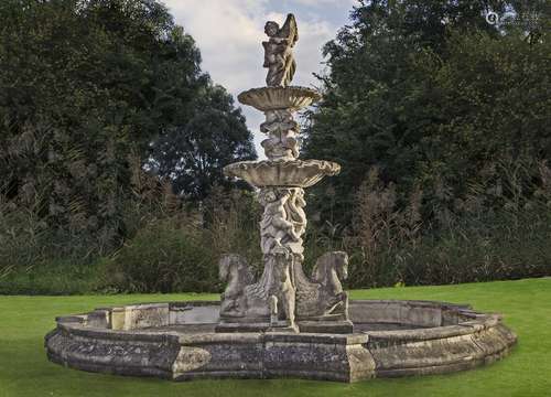 An elaborate and impressive stone composition two-tier garde...