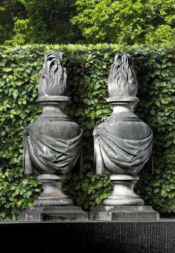 A pair of Continental carved white marble pier finials model...