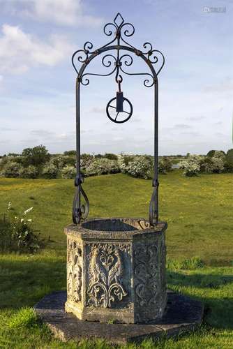 A Continental sculpted limestone and wrought iron mounted we...