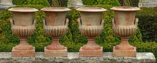 A set of four terracotta vases