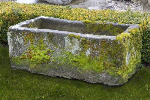 A carved limestone trough