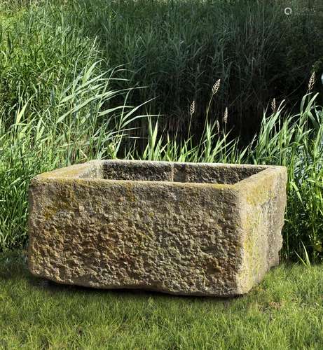 A carved limestone rectangular basin