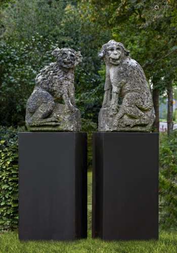 A pair of French sculpted limestone models of watchdogs