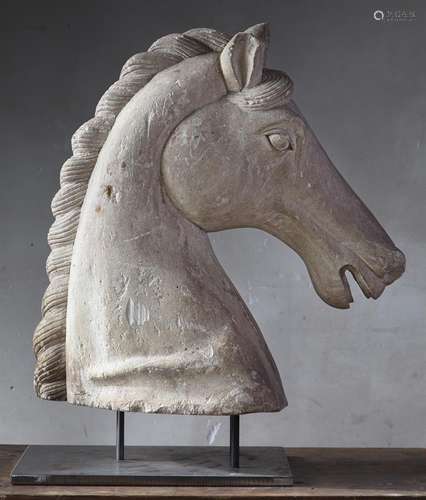 A sculpted limestone model of the head of a horse