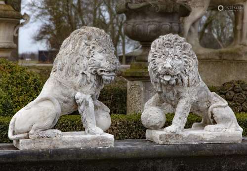 A pair of stone composition models of lions in 17th century ...