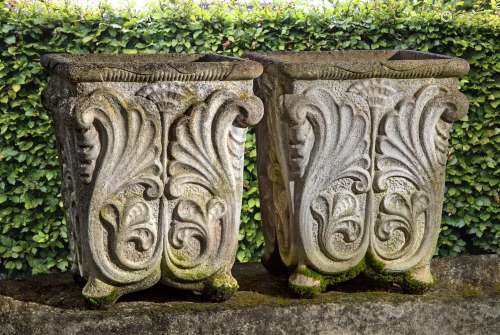 A pair of stone composition planters