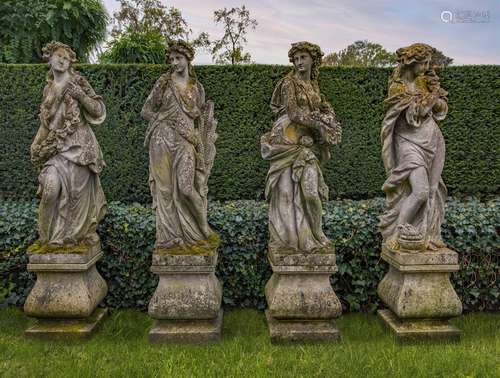 A set of four Continental sculpted limestone models of maide...