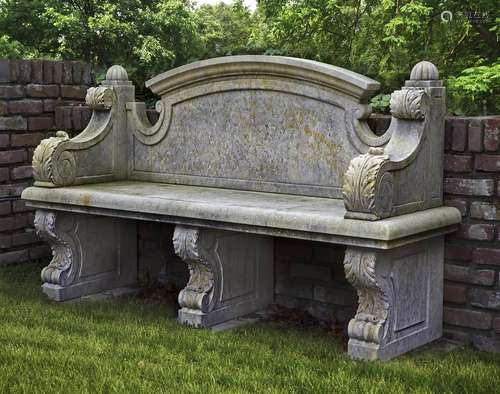 A carved limestone garden seat in 18th century style