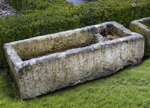 A carved limestone trough