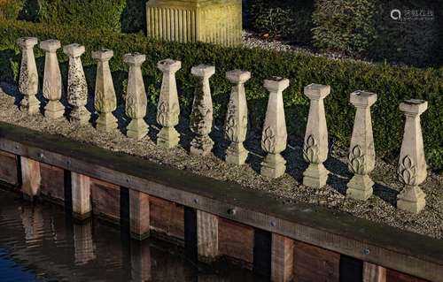 A set of 24 stone composition supports from balustrading