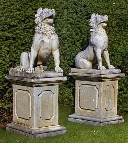 A pair of sculpted marble models of Molossian guard dogs