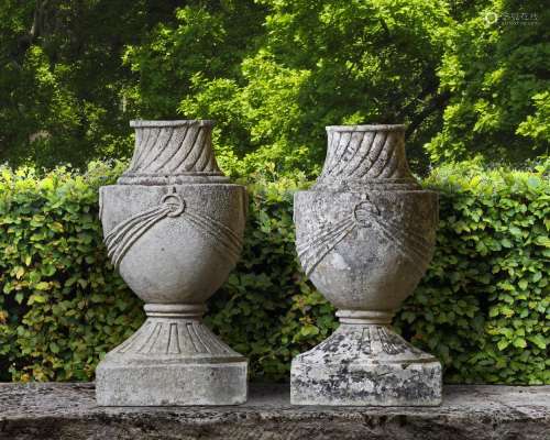 A pair of French carved limestone urn finials