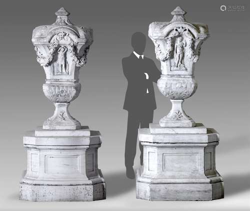 A pair of magnificent Italian sculpted white marble urns