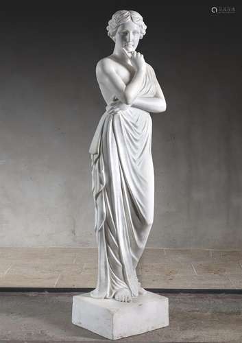 A sculpted white marble figure of a maiden in neo-classical ...