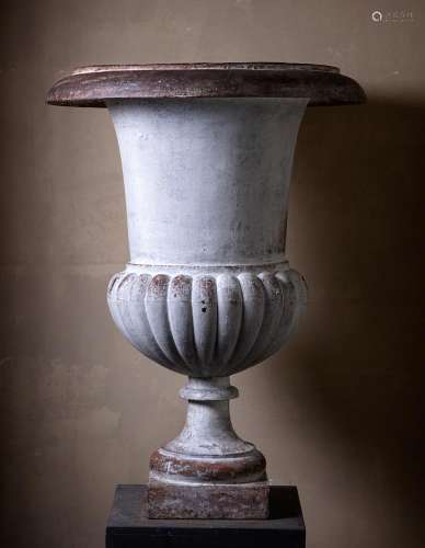 A large cast iron garden urn