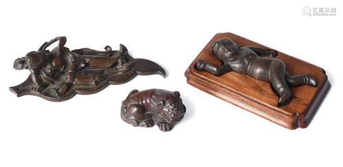 An attractive Chinese bronze Buddhist lion scroll weight