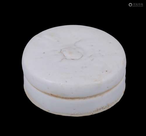 An unusual Chinese circular white-glazed stoneware inkstone ...