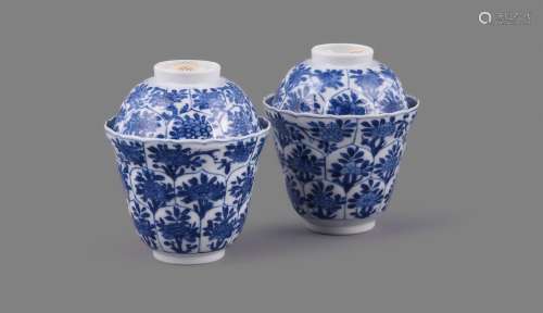 A good pair of Chinese porcelain blue and white moulded cups...